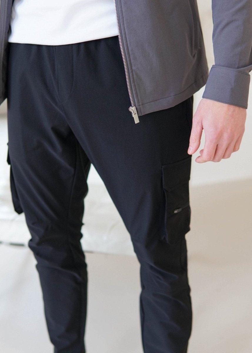 Tech Stretch Cargo Pant In Black - AURA